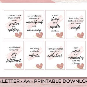 Puede incluir: Ocho tarjetas de afirmaci&oacute;n imprimibles para madres con corazones rosas y dorados y pinceladas. Las tarjetas presentan afirmaciones positivas sobre la maternidad, como "Creo un ambiente hogare&ntilde;o que es positivo y edificante." y "Soy una madre fuerte y capaz."