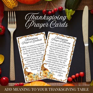 May include: Thanksgiving prayer cards with text, featuring prayers of gratitude and blessing. The cards have a decorative border with fall harvest imagery. The image includes a fork, knife, and fall harvest elements.