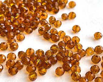 100 - 4mm Dark Amber Faceted Round Beads #1545