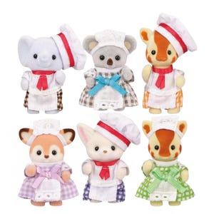 May include: Six animal figurines dressed as chefs. The figurines include an elephant, koala, giraffe, deer, fox, and another giraffe. Each figurine wears a chef's hat with a red stripe, a white apron, and a colored dress or outfit.