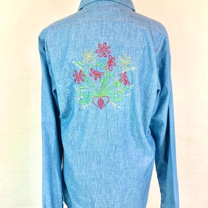 Vintage Fruit of the Loom soft, blue chambray button up with floral embroidery.