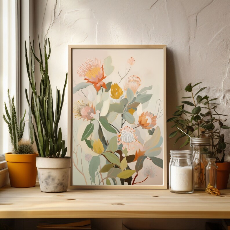 May include: A framed print of a botanical illustration featuring a bouquet of pink, white, and yellow flowers with green leaves on a light pink background.