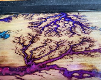 Poplar wood tray stained black, with gorgeous purple, blue and pink colored resin.  16.5" x 7" x 3.25"