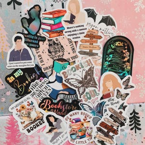 May include: A collection of colorful stickers with various designs and text. The stickers feature illustrations of books, butterflies, and quotes like "Bookish Soul" and "I have lived a thousand lives." The stickers are perfect for decorating laptops, notebooks, or other items.