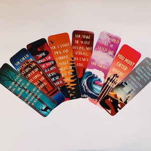 May include: A set of ten colorful bookmarks with inspirational quotes printed on them. The bookmarks feature various designs, including a deer, a wave, and a mountain range.