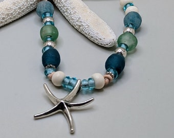 Handcrafted beaded silver and Leather Necklace-Summer Beach Starfish Pendant with Recycled glass and Bone Bead Accent.