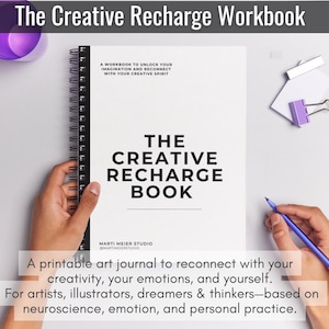 May include: A white spiral-bound workbook titled "The Creative Recharge Book" with black text. The cover features the title in large, bold letters. The workbook is designed to help artists, illustrators, and dreamers reconnect with their creativity.
