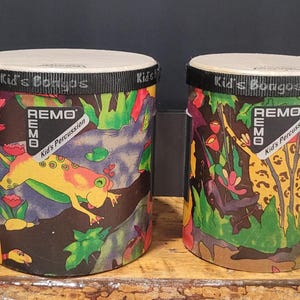 Kids Percussion Bongo  Rainforest Graphics Features Skyndeep Pre-tuned Drumheads Pre-Owned in Excellent Consition By REMO