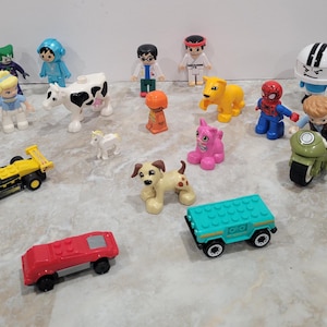 Vintage set of Lego Figures 9 Figurines 4 Vehicles Motorcycle 5 Animals Cinderella Joker Spiderman Karate Astronaut Builder Cat Dog Cow Pony