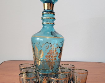 Vintage Czech Bohemia Genuine Jeweled Murmac  Decanter & 8 Glasses w/ Label Blue and Gold Grape Leaf Design on Bottle and Glasses
