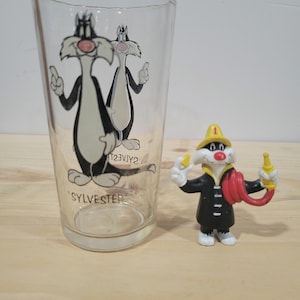 Vintage 1973 Pepsi  Promo Sylvester the Cat Drinking Glass Paired with a Sylvester in Fireman Gear 1986 Arby's Bonus Toy Warner Bros