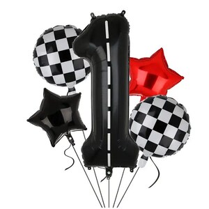 May include: A collection of foil balloons in a racing theme. Includes a large black number one balloon with a white stripe, two checkered balloons, and two star-shaped balloons, one black and one red. Perfect for a birthday party.