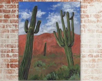 May include: An oil painting of a desert landscape featuring tall green saguaro cacti under a blue sky with white clouds. A red-orange mountain range is in the background, with green shrubbery in the foreground.