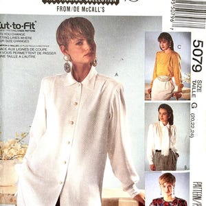 May include: A vintage sewing pattern titled "SEW NEWS THE FASHION COLLECTION FROM/DE McCall's." The pattern features a woman wearing a white button-down shirt. Additional images show other clothing options. The pattern includes size G (20,22,24).