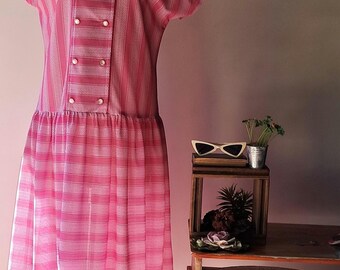 Vintage dress,size 12, quarter short sleeve made in Australia, new old stock with tags.