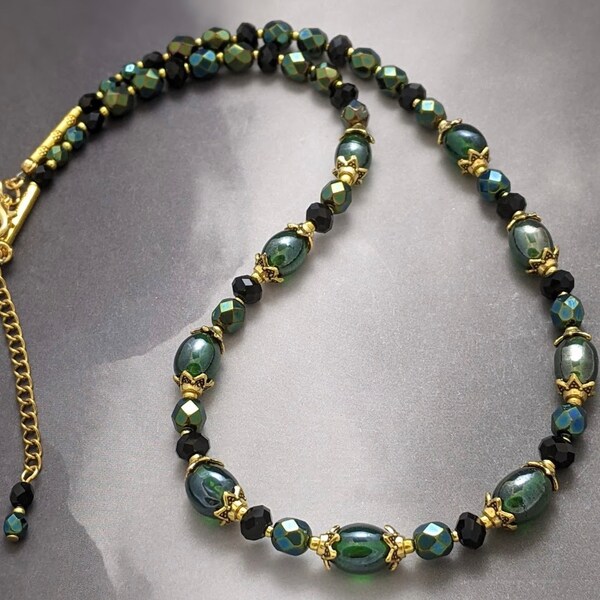 Lustrous Green Necklace with Black and Iris Czech Glass Beads Gold Tone