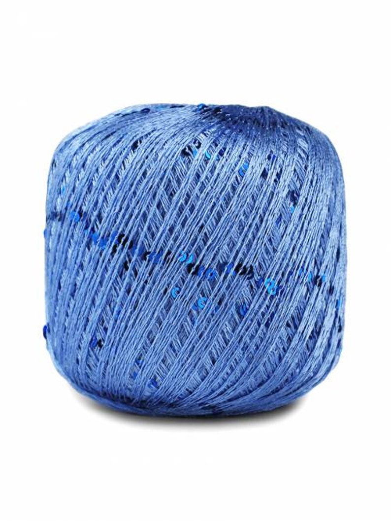 May include: A ball of blue yarn with silver sequins woven throughout.
