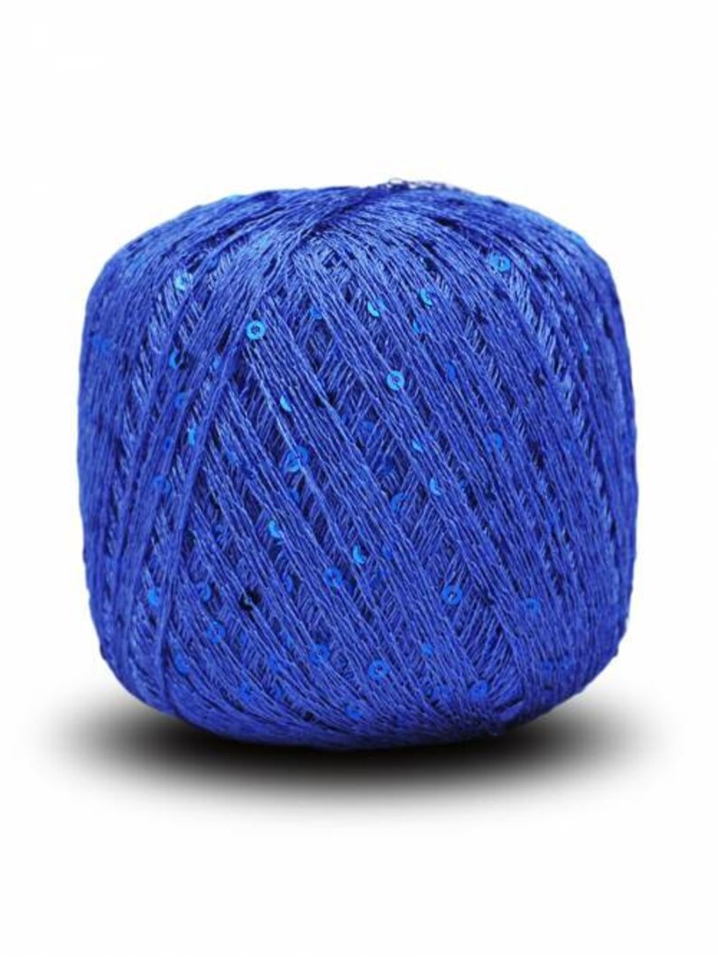 May include: A ball of blue yarn with silver sequins woven throughout.