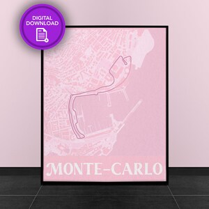 May include: A pink and white digital print of the Monte Carlo race track map. The map is framed in a black frame and the text "MONTE-CARLO" is printed in white at the bottom of the map.