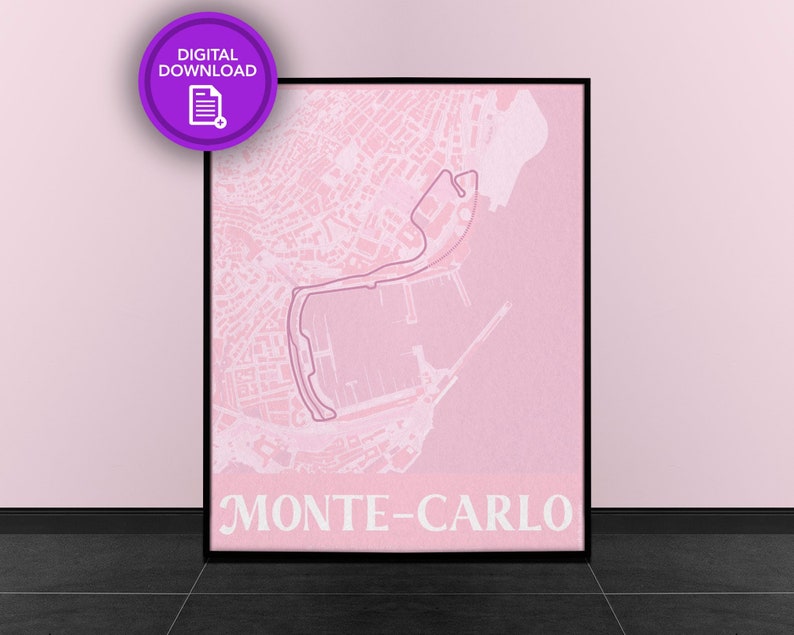 May include: A pink and white digital print of the Monte Carlo race track map. The map is framed in a black frame and the text "MONTE-CARLO" is printed in white at the bottom of the map.