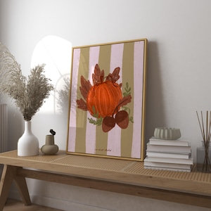 May include: A digital illustration of a pumpkin with leaves and acorns on a striped background. The pumpkin is orange and the leaves are brown and green. The background is a light pink and brown striped pattern.