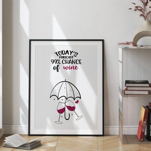 Könnte beinhalten: Ein schwarzer gerahmter Druck mit dem Text "TODAY'S FORECAST 99% CHANCE of wine" und einer Schwarzweißillustration von zwei Weingläsern unter einem Regenschirm.