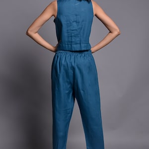 Top and pant
✽ Sleeveless top 
✽ Fabric button which are Functional
✽ Tapered pants with side pockets  
✽The soft Elastic waist band automatically adjust to a gentle hold without the hassle of zipper or bottom clause