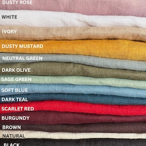 May include: A stack of 14 fabric swatches in various colors, including dusty rose, white, ivory, dusty mustard, neutral green, dark olive, sage green, soft blue, dark teal, scarlet red, burgundy, brown, natural, and black.