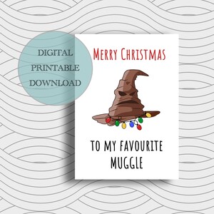 May include: A white card with the text "Merry Christmas" in red, and "To My Favourite Muggle" in black. The card features a brown Sorting Hat with a string of colorful Christmas lights. A digital printable download.