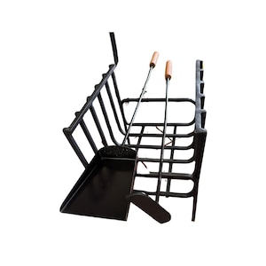 May include: Black metal fireplace tool set with a shovel, poker, and a log holder. The tools have wooden handles. The set is designed to hold firewood and tools for a fireplace.