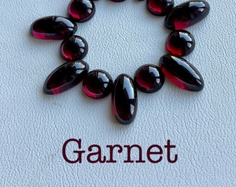Beautiful lot of red-purple garnet. 100% natural. Oval and round garnet. 14 stones.