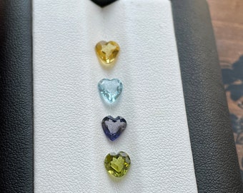 Mix of natural gems, heart shape. Aquamarine.Yellow beryl. Peridot.Iolite.