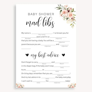 May include: A printable baby shower game card with the title "Mad Libs" and instructions to fill in the blanks with words to create a funny story. The card features a floral design with pink and white flowers.
