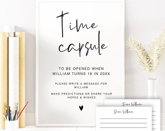 May include: A white framed sign with black text that reads "Time Capsule" and instructions for a time capsule to be opened when William turns 18 in 20XX. The sign also includes a small black heart.