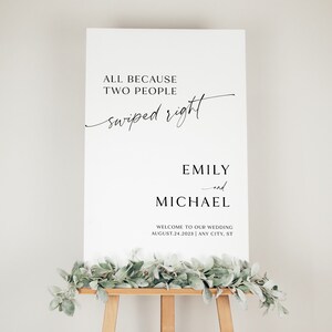 Puede incluir: Un cartel de boda blanco con texto negro que dice "All because two people swiped right. Emily and Michael. Welcome to our wedding August 24, 2023 | Any City, ST"