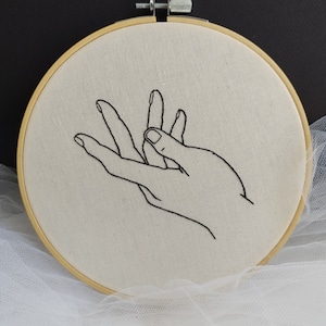 Minimalist outline hand embroidery