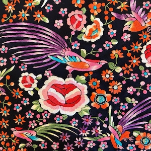May include: Intricate embroidered fabric with a black background, showcasing colourful birds and flowers. The birds have purple tail feathers, and the flowers are red, pink, orange, and blue. The design is detailed, creating a vibrant textile.