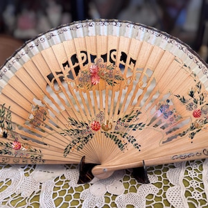 Vintage  hand-painted fan with intricate wood carving