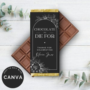 May include: Black and gold chocolate bar wrapper with white floral design. The text reads "Chocolate to Die For" and "Thanks for Celebrating Olivia Jones".