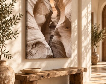 May include: A large square canvas wall art print featuring a high-resolution photograph of a narrow, winding slot canyon with smooth, light beige and tan sandstone rock formations that create deep, flowing, and layered textures.
