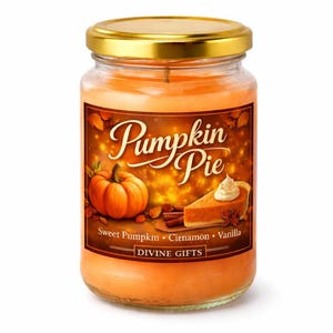 May include: A glass jar candle with a gold lid, filled with orange wax. The label reads "Pumpkin Pie" with images of a pumpkin and pie slice. The scent includes sweet pumpkin, cinnamon, and vanilla. "Divine Gifts" is printed at the bottom.