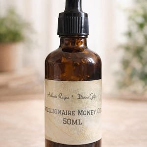 Millionaire Money Hoodoo Oil: Magisk parfym med örter och rötter (50ml)