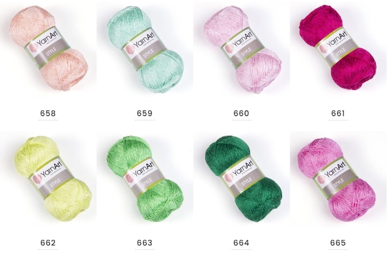 Pode incluir: Oito novelos de fio YarnArt Style em v&aacute;rias cores, incluindo rosa, verde e azul claro. Cada novelo tem um r&oacute;tulo com o nome da marca e "Style" escrito nele.