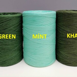 May include: Three spools of paper cord, one green, one mint green, and one khaki. The spools are labeled "GREEN", "MINT", and "KHAKI".