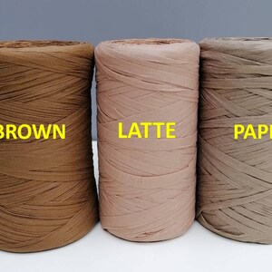 May include: Three spools of paper cord in brown, latte, and beige colors. The spools are labeled "BROWN", "LATTE", and "PAPER".