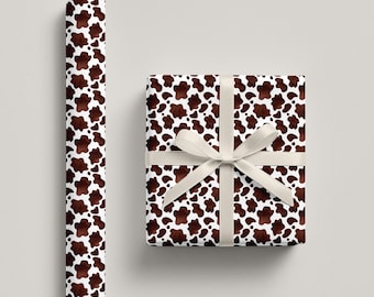 Papel de regalo con estampado de vaca