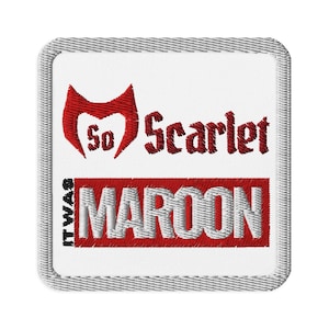 May include: White embroidered patch with a red stylized 'M' and the text 'So Scarlet It Was Maroon'.
