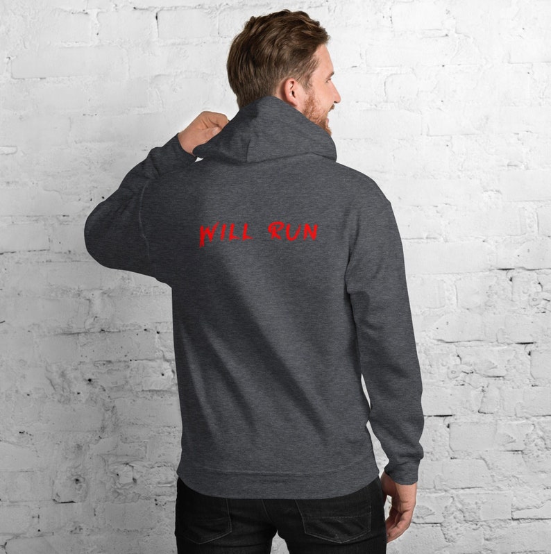 May include: A dark grey hooded sweatshirt with the text "WILL RUN" in red on the back.