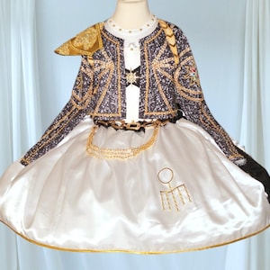 rumi gold dress Rumi  Raja Salahuddin