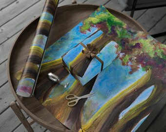 May include: A roll of wrapping paper with a colorful abstract design featuring brown, blue, green, and yellow hues. A small gift box is wrapped with the same paper and tied with a brown ribbon. A pair of scissors and a roll of tape are also visible.